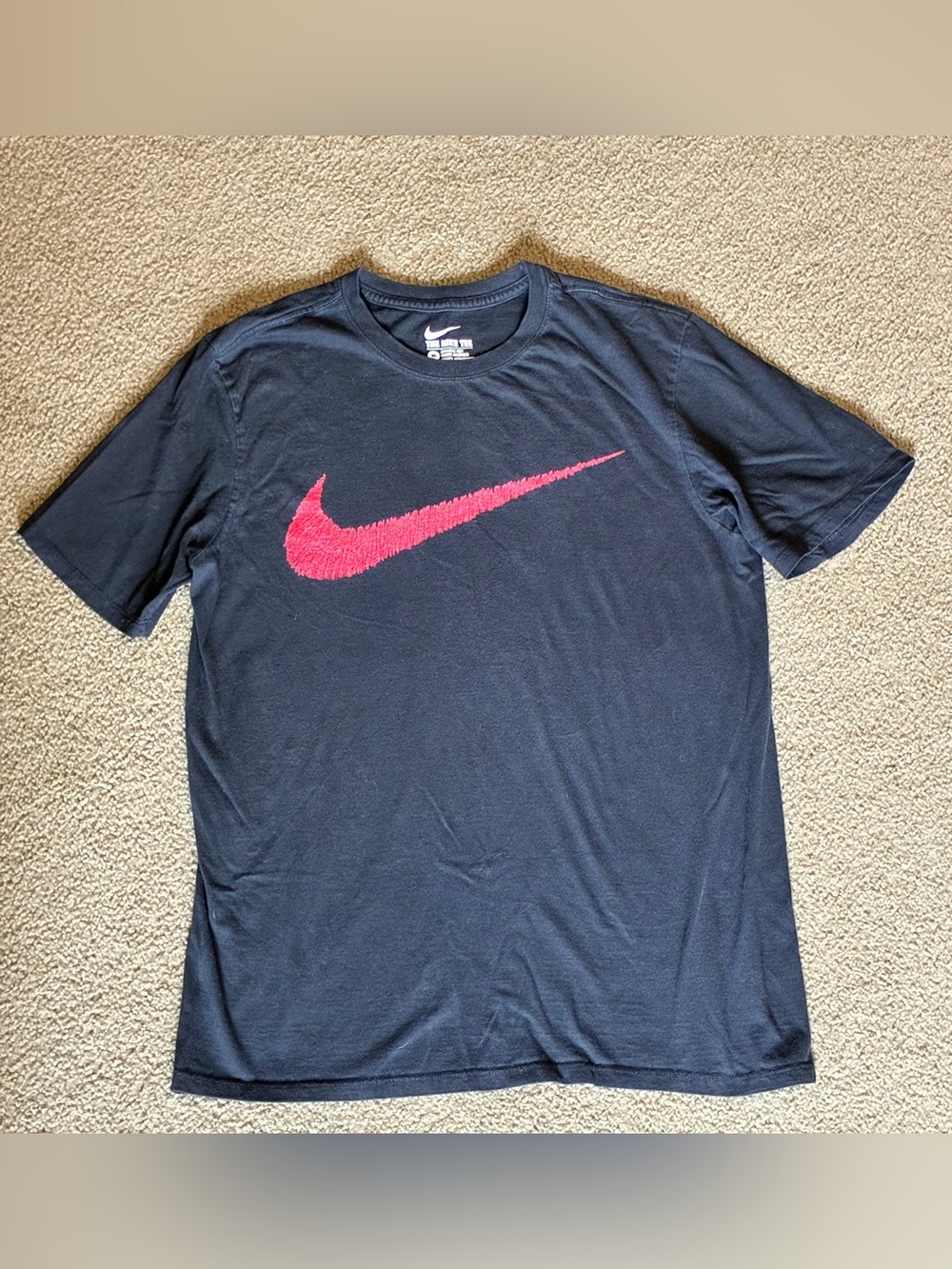 Women’s black Nike Athletic T-shirt with front red swoosh size medium